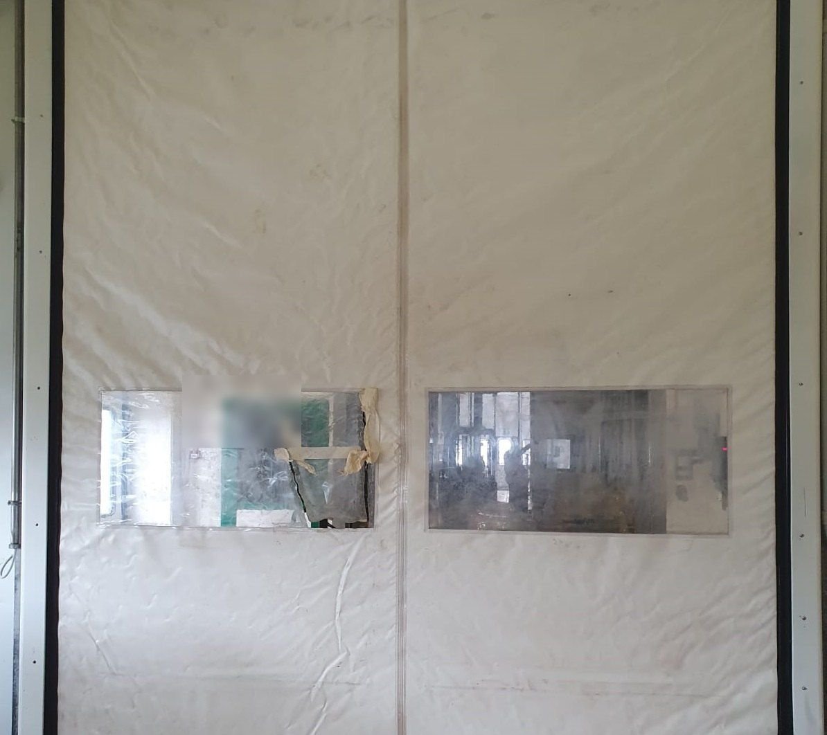 Riparazione del telo di una porta ad apertura rapida a Torino