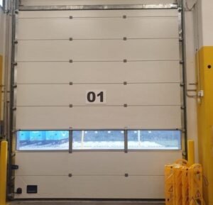 automazione portone sezionale con porta Hormann Torino